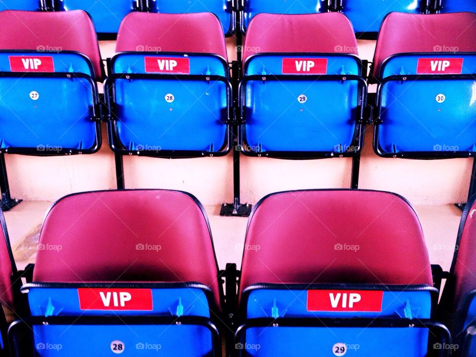 Blue VIP-chairs on sport arena