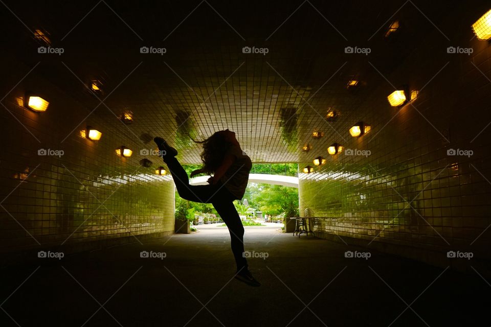 Jumping in the tunnel, in the garden