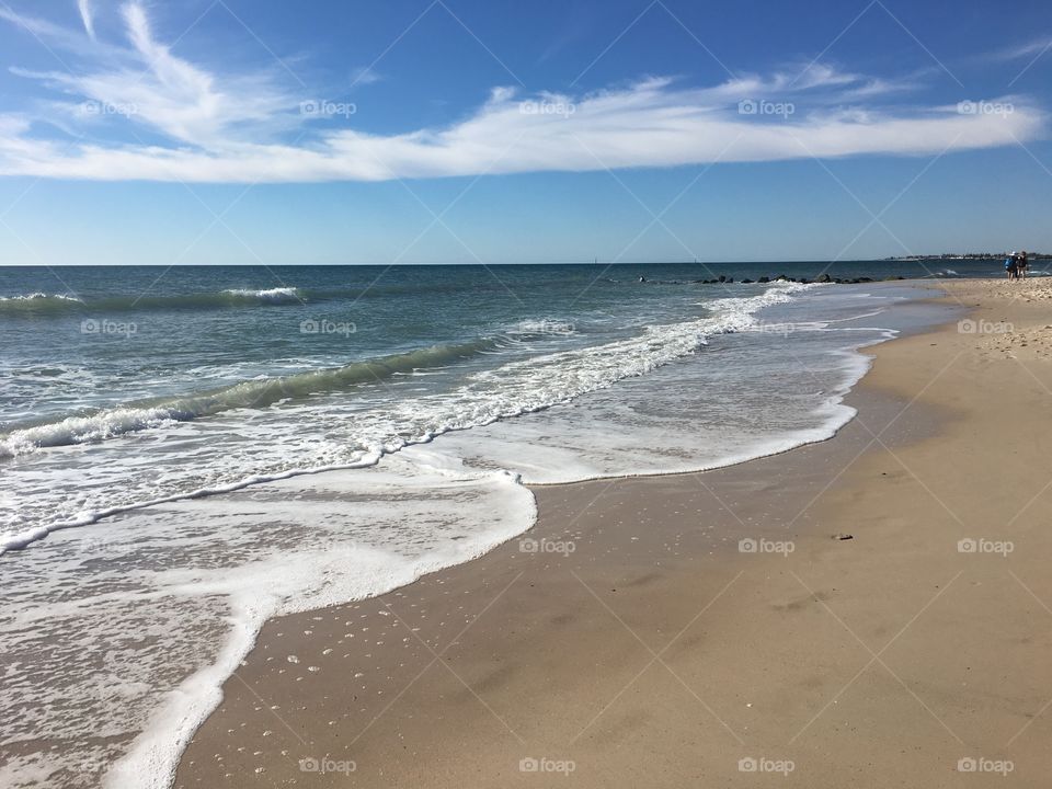 Pristine remote beach, hues of blues and tans