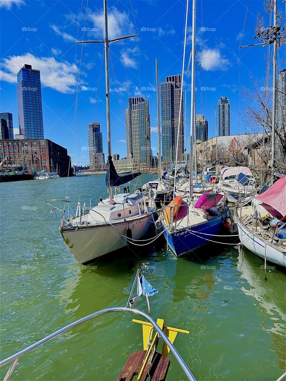 This is “Newtown Creek” with its many boats by the “Pulaski Bridge” in LIC. The best views are from aboard one of them such as “Salvation”, the “28 ft 1969 Luhrs” cabin cruiser that I & partner “Timothy Trespas” call home. 2024. Hypnotic Productions