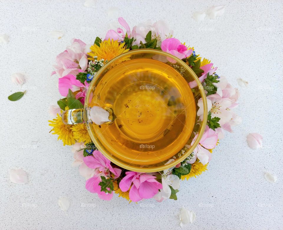 glass of tea and flowers.