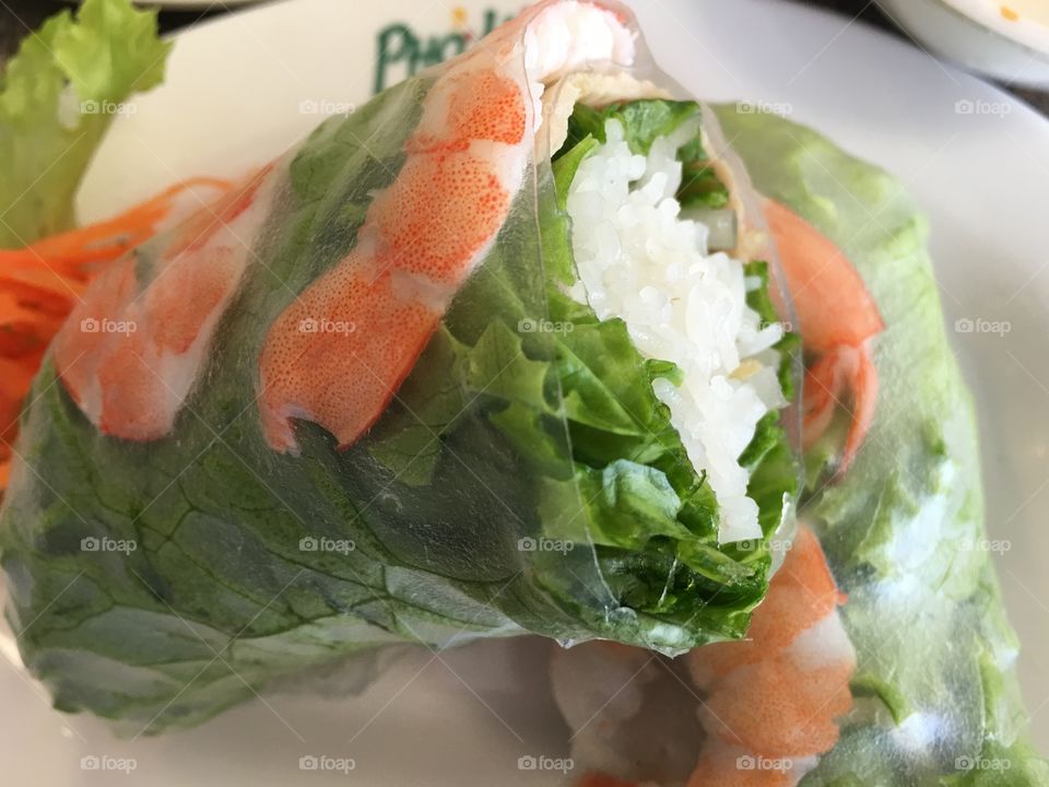 Vietnamese spring roll, rice paper, prawns, lettuce, rice, closeup image