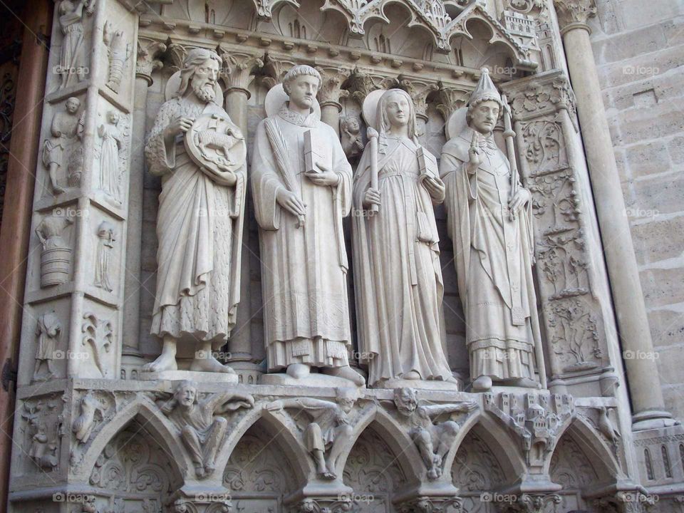 Four imposing religious figures in stone