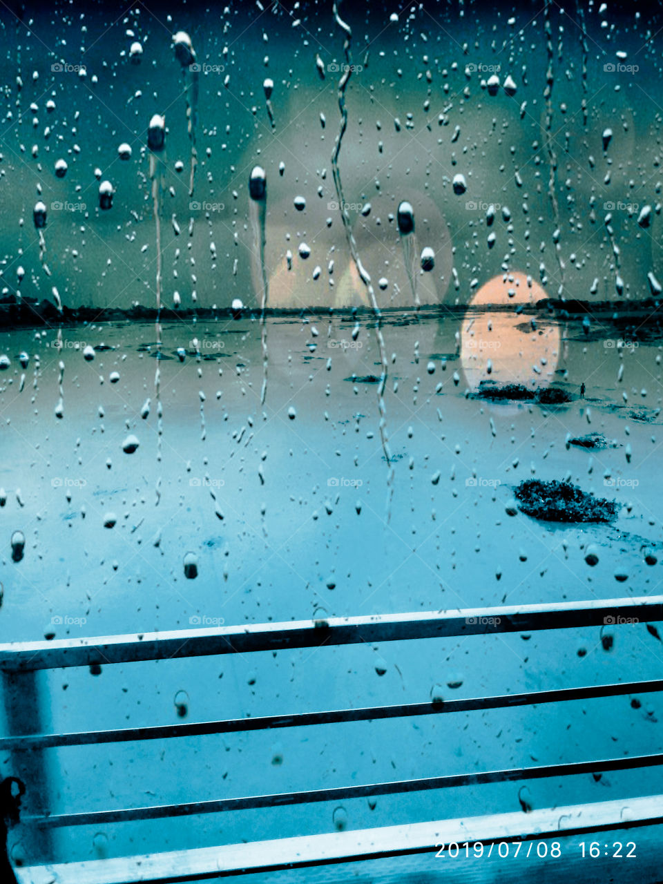 Title-. Supreme Solace
Description-The image of a bridge and river was captured from a running train window on a rainy day.
Location- Dooars,West Bengal,India