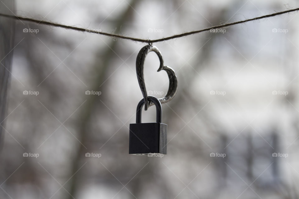 Heart and lock on the rope. heart closed to love concept