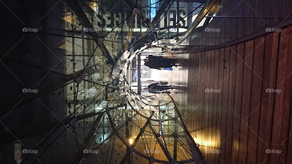 Hallway and bridge with mirrors during night in Manchester, England.