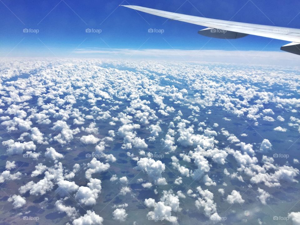 Over the clouds. In fly over the clouds in a big plane