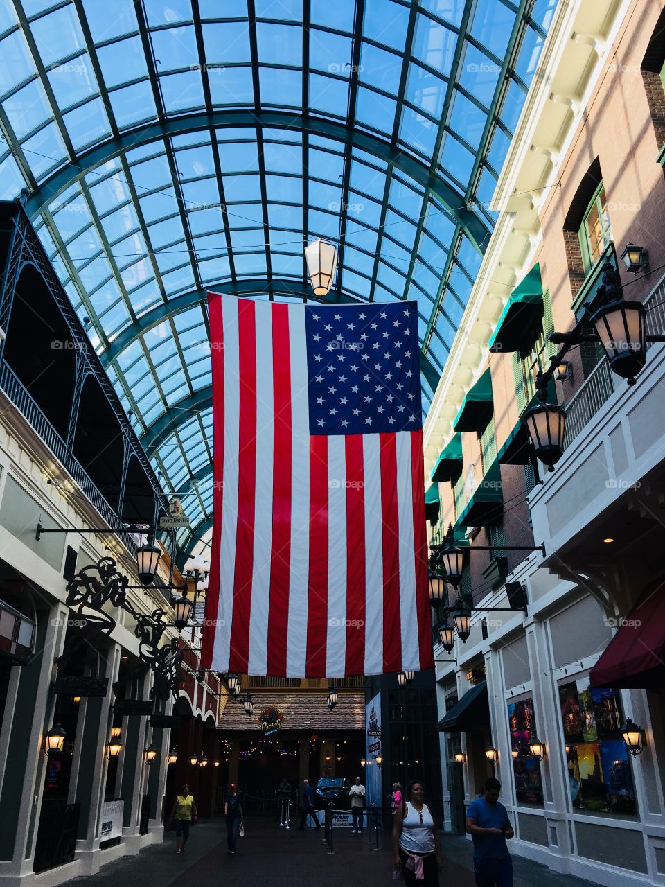 USA flag hanging inside mall