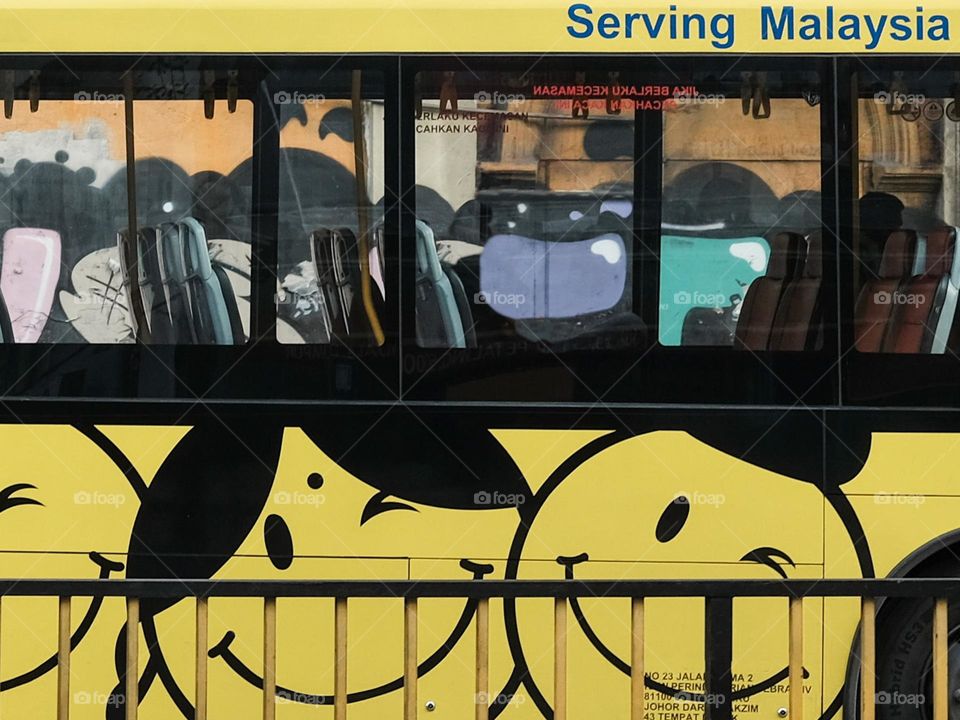 Serving Malaysia artwork on a bus