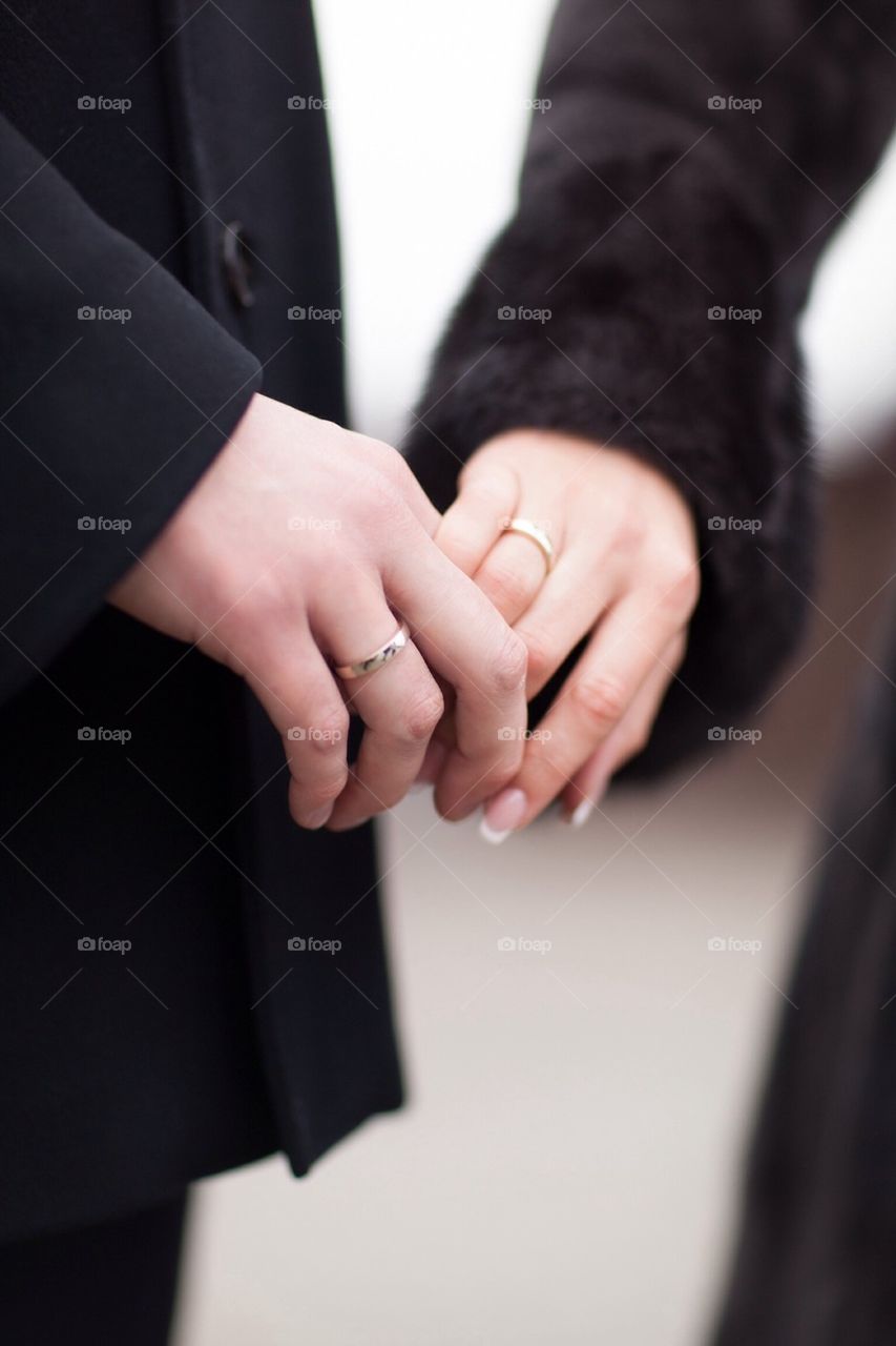 Bride And Groom Holding Hands