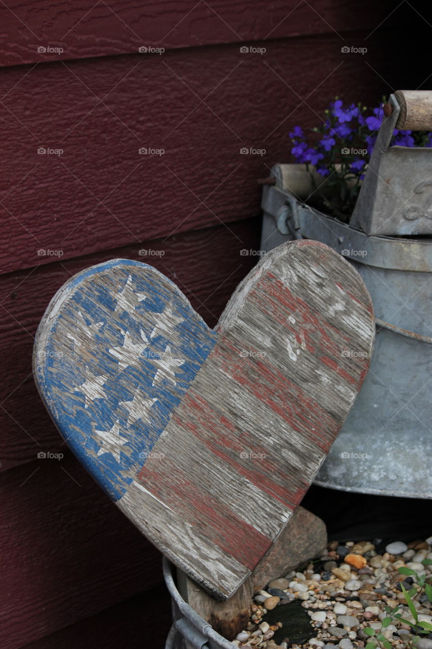Wooden heart shaped American flag