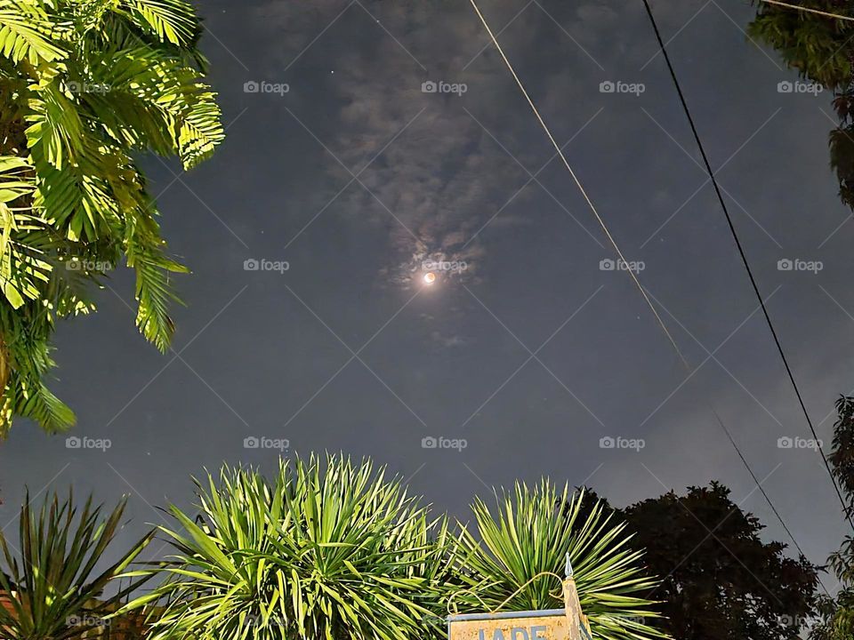 in the Dragon's mouth. Lunar Rclipse. Cloud Imagination Formation.