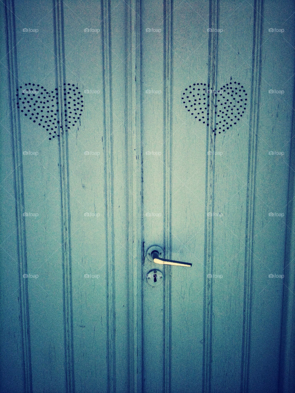 Blue door with hearts