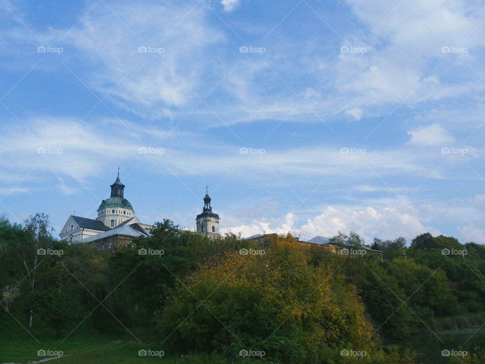 The striking monastery-fortress of the Order of the Barefoot Carmelites in Berdichev. A striking unexpected complex with powerful fortress walls, several towers, a church, a monastery, a bell tower, shops. All this was built here in 1642!