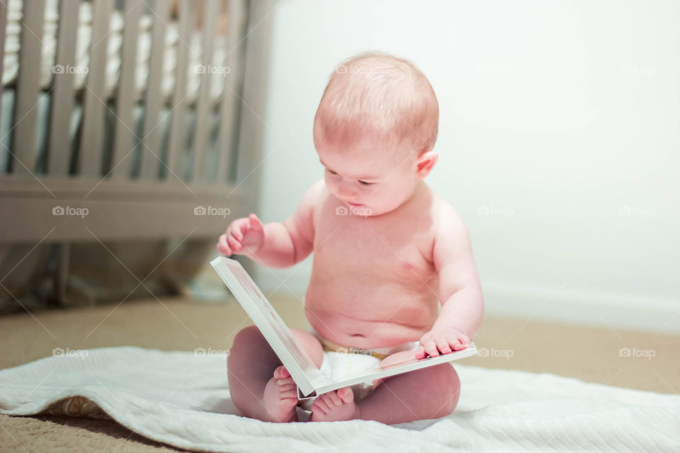 Baby with book