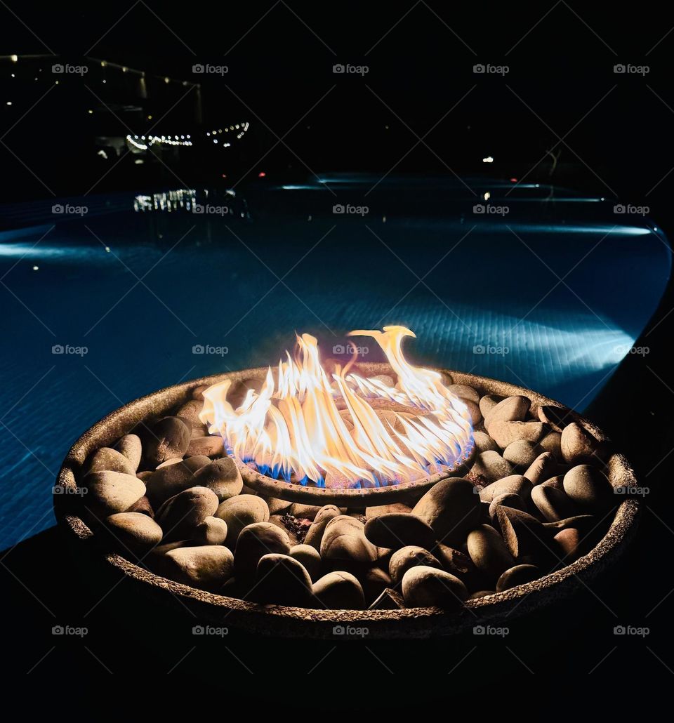 Fire pit at a swimming pool