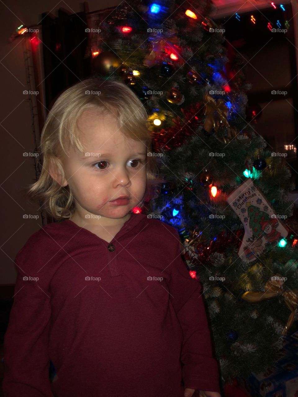 little boy can't wait for Christmas