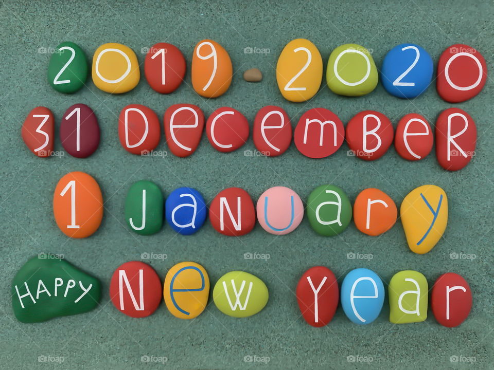 31 December 2019, 1 January 2020, Happy New Year with a creative composition of multi colored stone letters