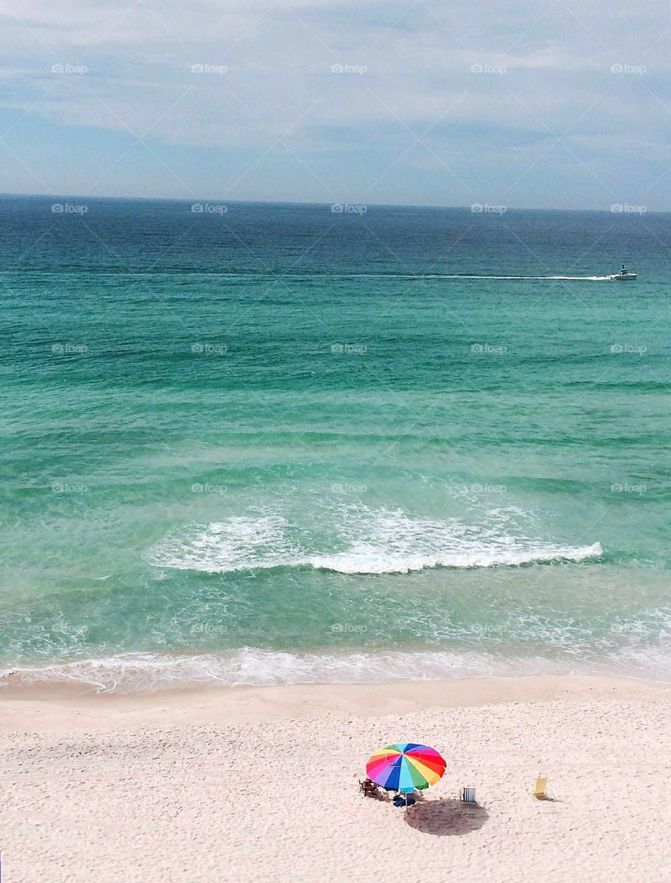 My beach umbrella . Fun at beach & my colorful umbrella 