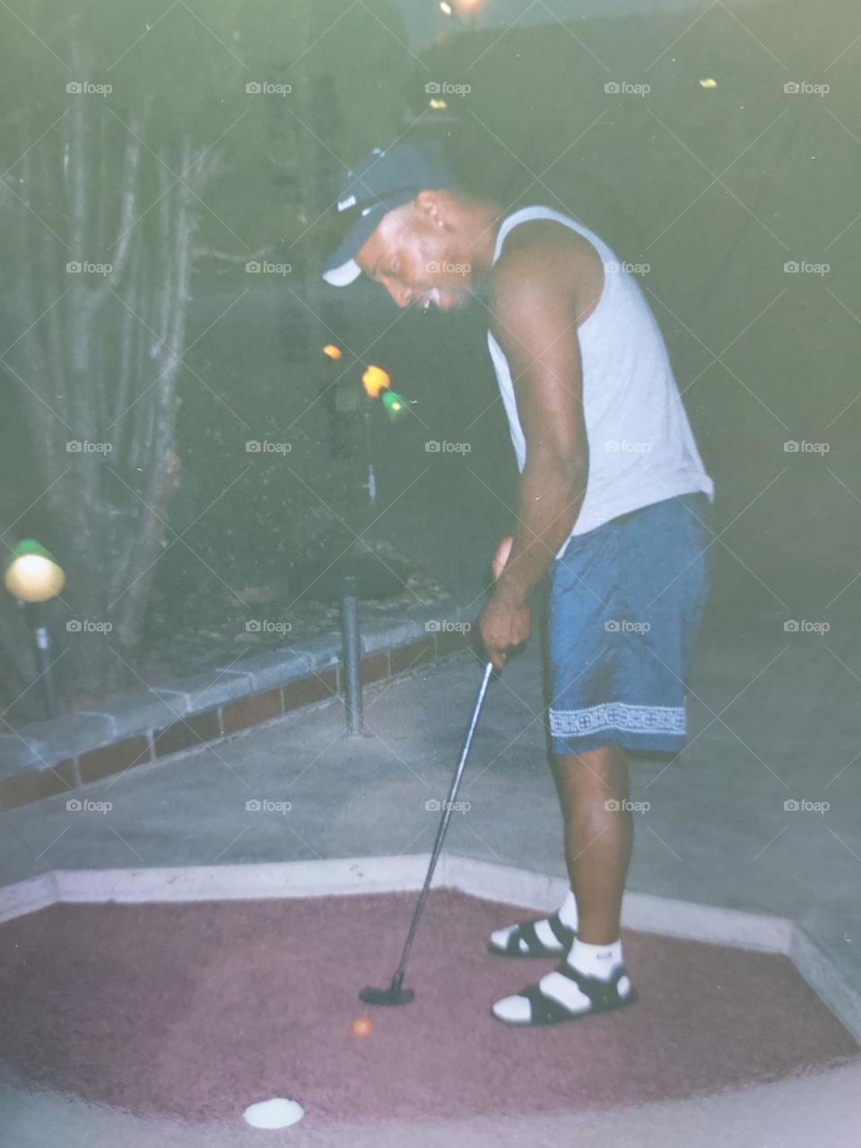 Summertime days playing miniature golf