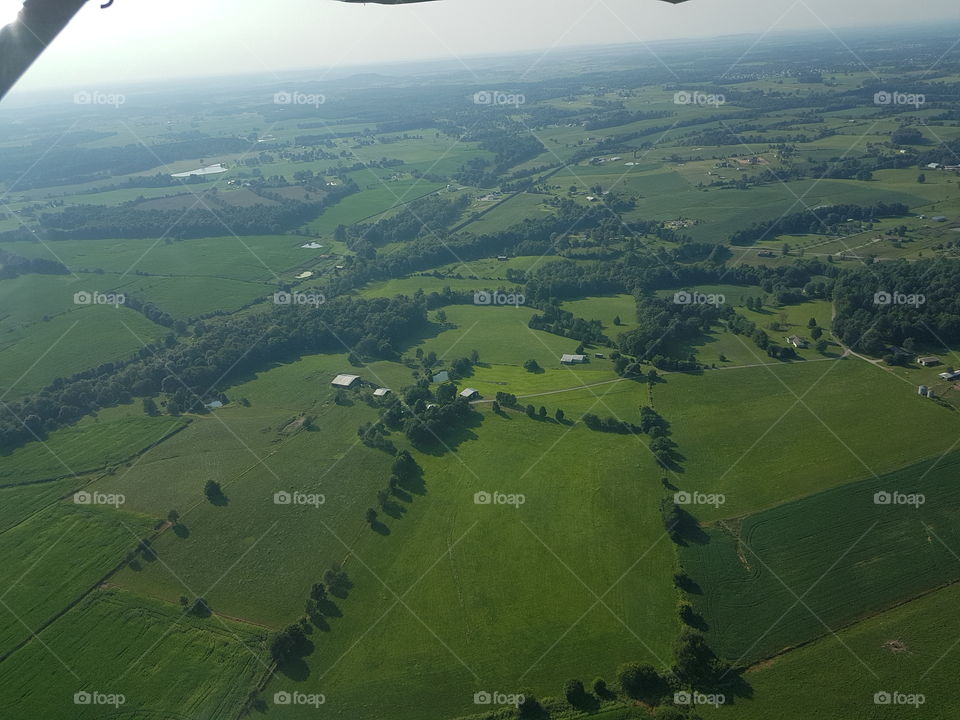 Green, rural Landscape from above while flying