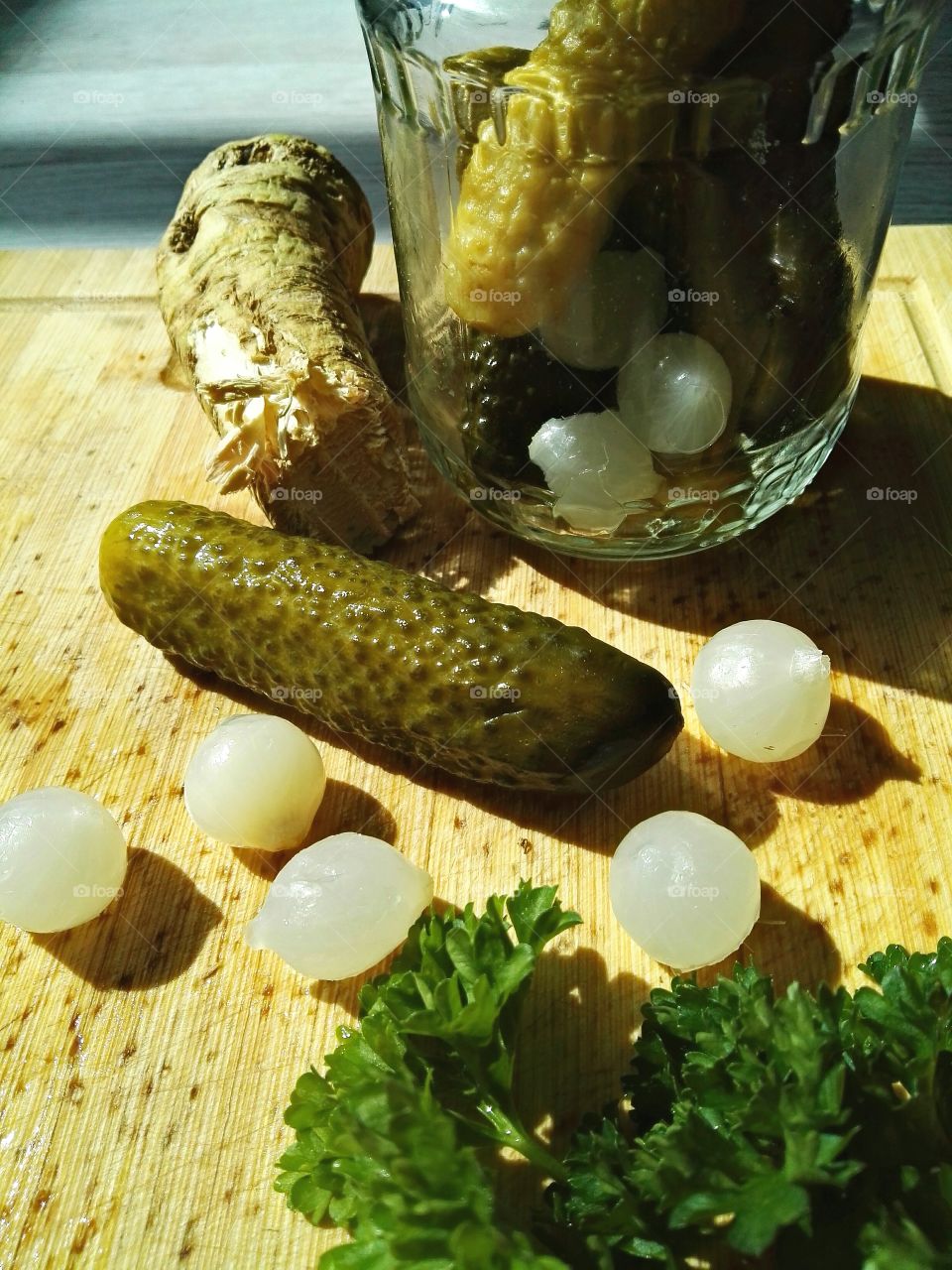 Homemade pickles with onion and horseradish