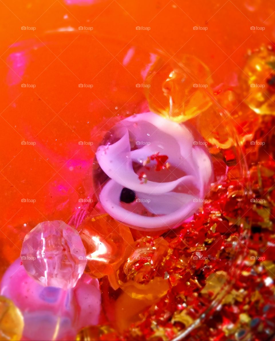 Pink marble in sparkley red, orange.