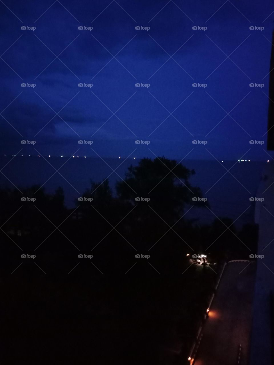 Twilight sky with fishing boats'lights