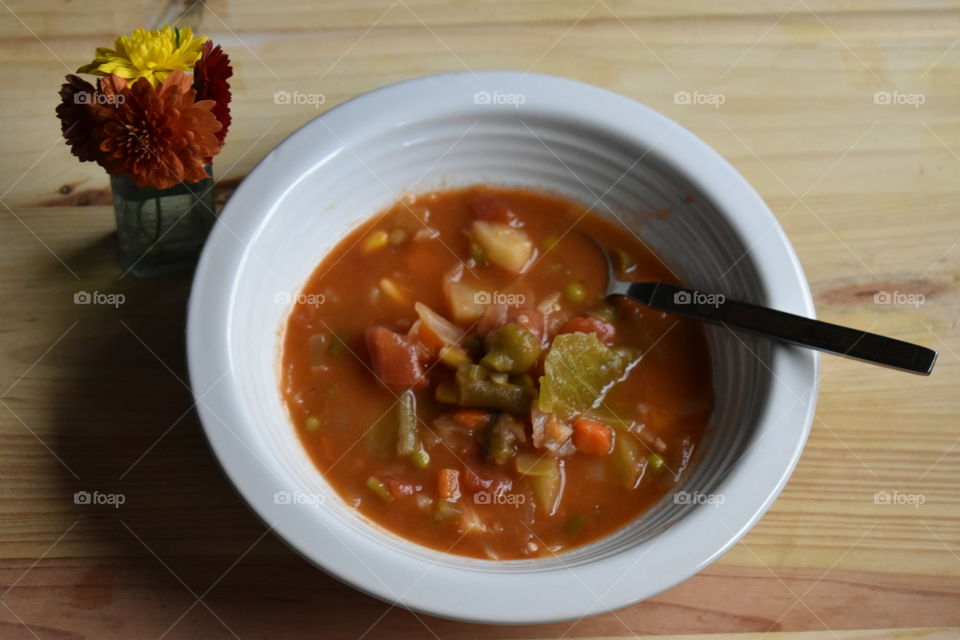 a nice bowl of vegetable soup on a cold rainy day.