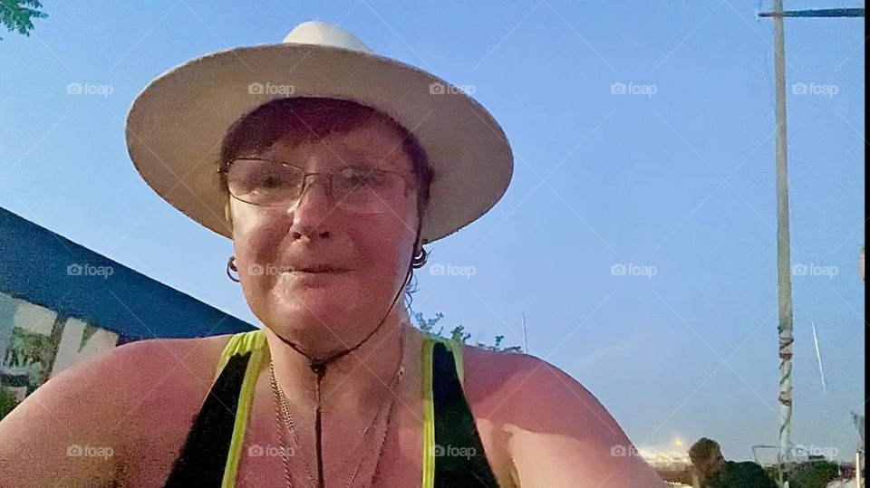 This is me, “Petra Schiller” a.k.a. “Maxine Firefox” a.k.a. “Maximiliane Feuerfuchs” sitting on a dock at “Newtown Creek” in LIC, Queens to watch the “Independence Day” “July 4th” “Macy’s” fireworks that are about to begin. 2023. Hypnotic Productions
