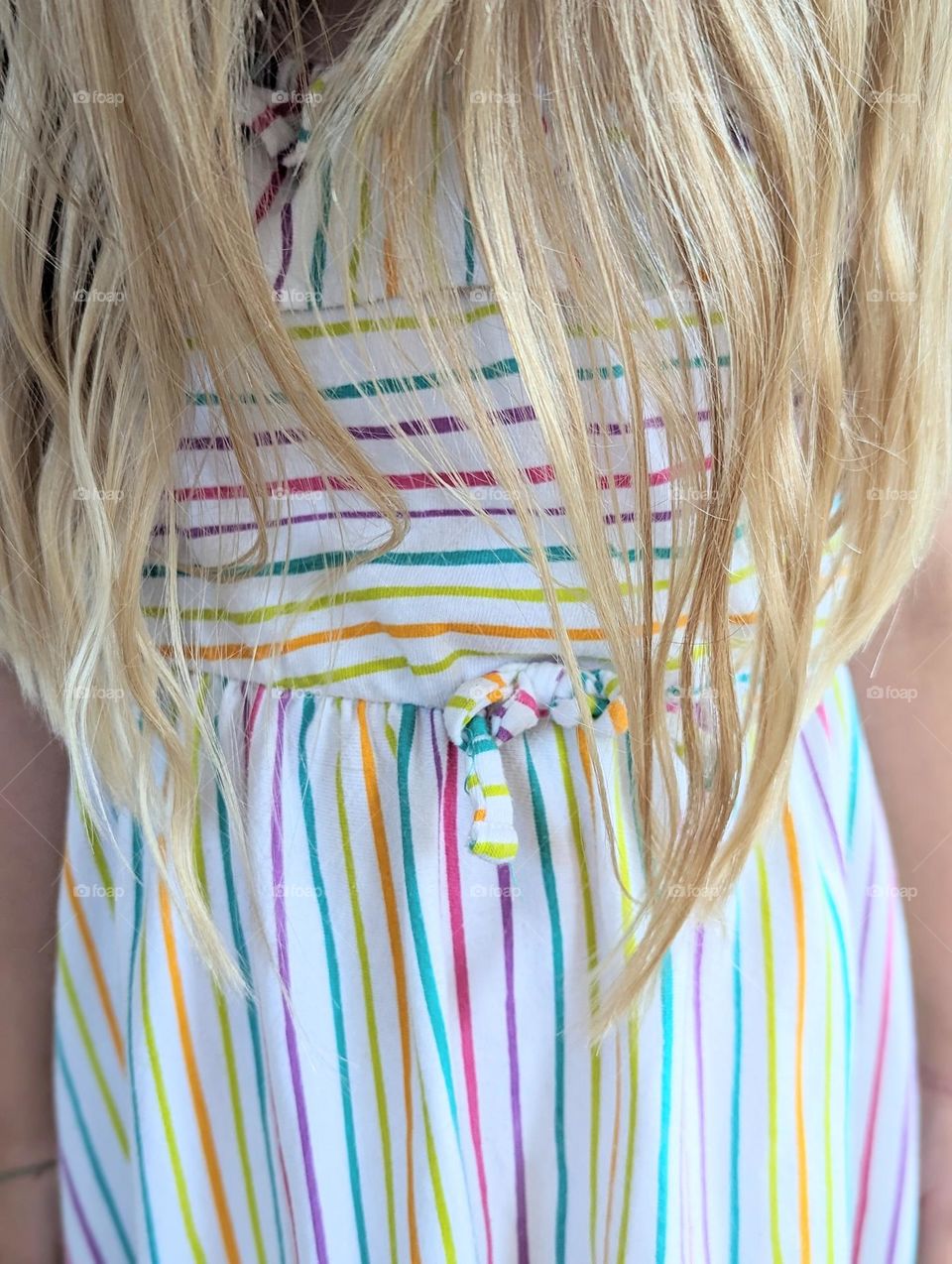 rainbow striped dress with bow and ruffles pride color mission rainbow summer dress with blonde hair