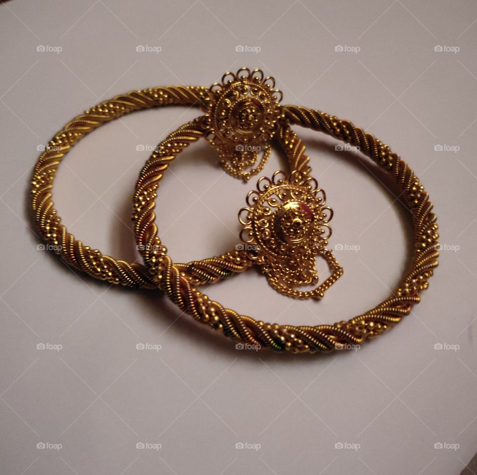 Golden Bangles are loved by all females to wear, which enhances the beauty