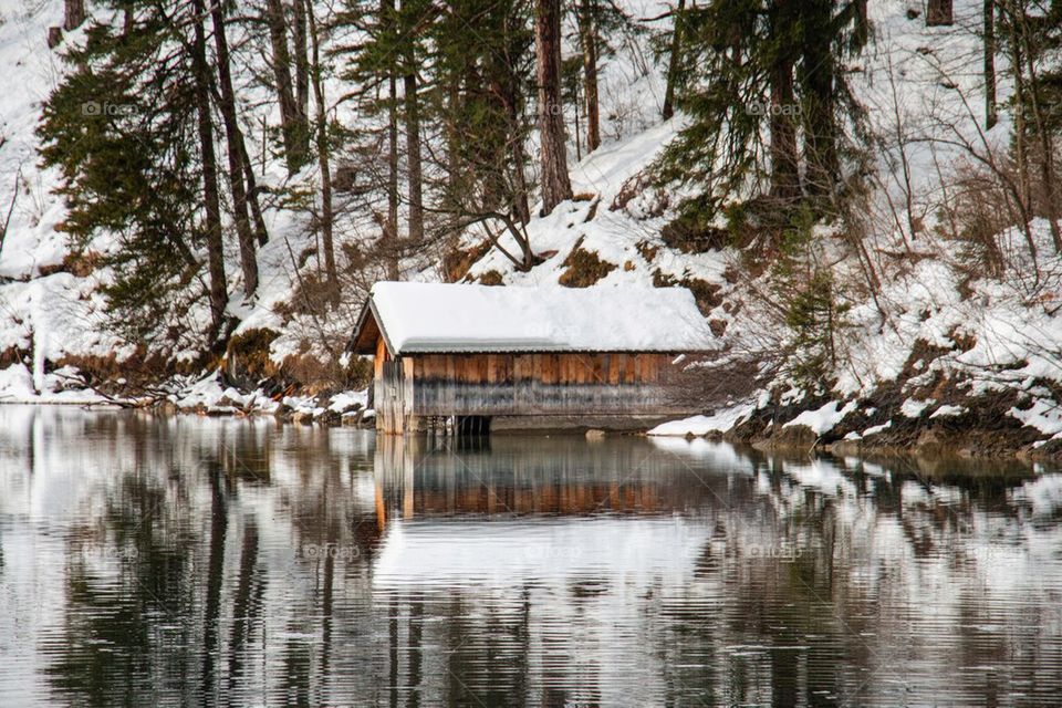 View of log cabin in snow covered winter