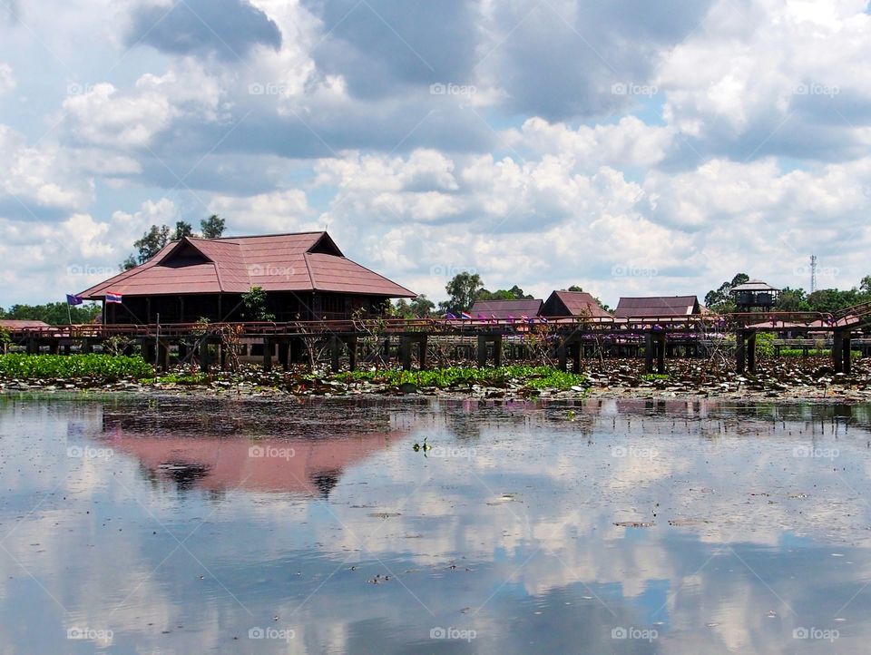 Houses at the lakeside with reflection