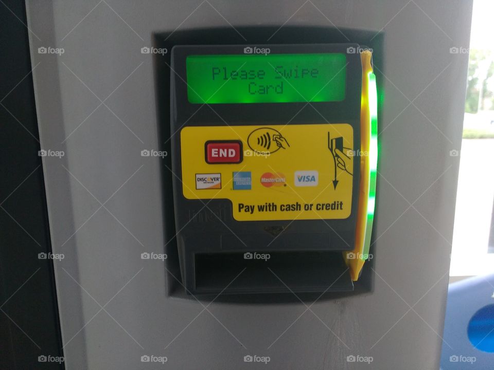 swipe to pay with credit card on vending machine (landscape)