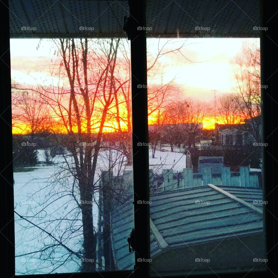 Sunrise seen from a window