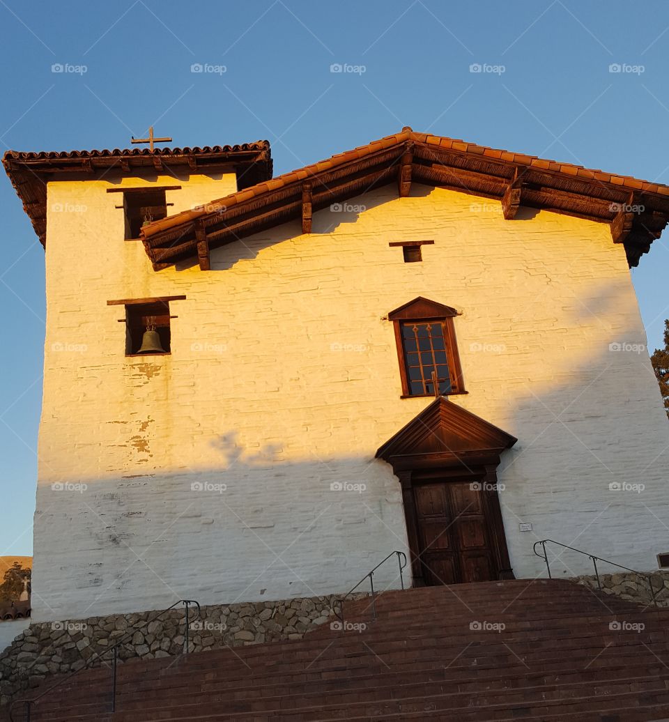 This is Mission San Jose in Fremont. We drive past after hours but thought the sun setting gave it a lovely glow.