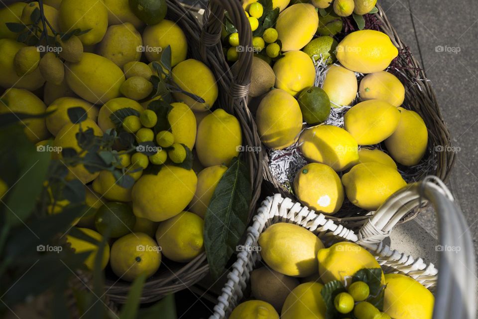 artificial plastic lemons in boxes