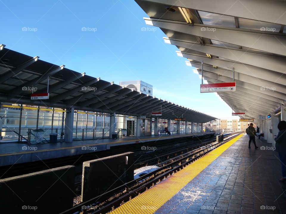 It is one of the stations in Boston with a clear, blue sky as the backdrop.