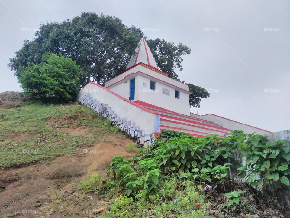 Temple of Lord Shiva over the hill.
