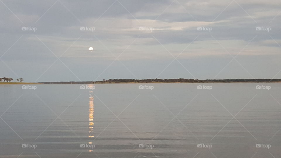 moon rising over Lake Summerville State Park Texas
