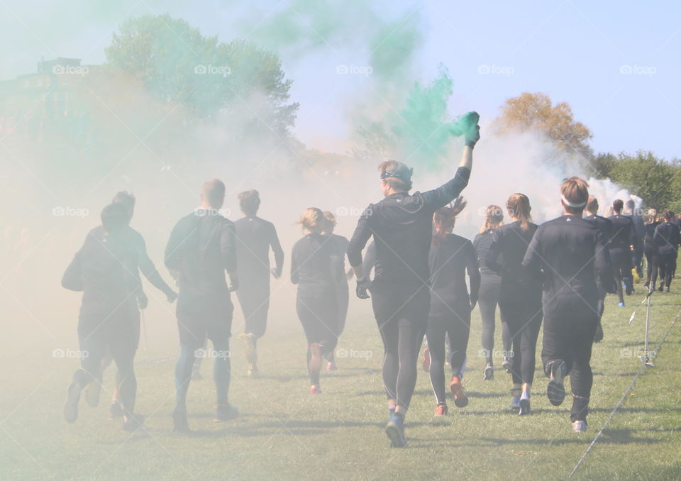 Runners in party smoke