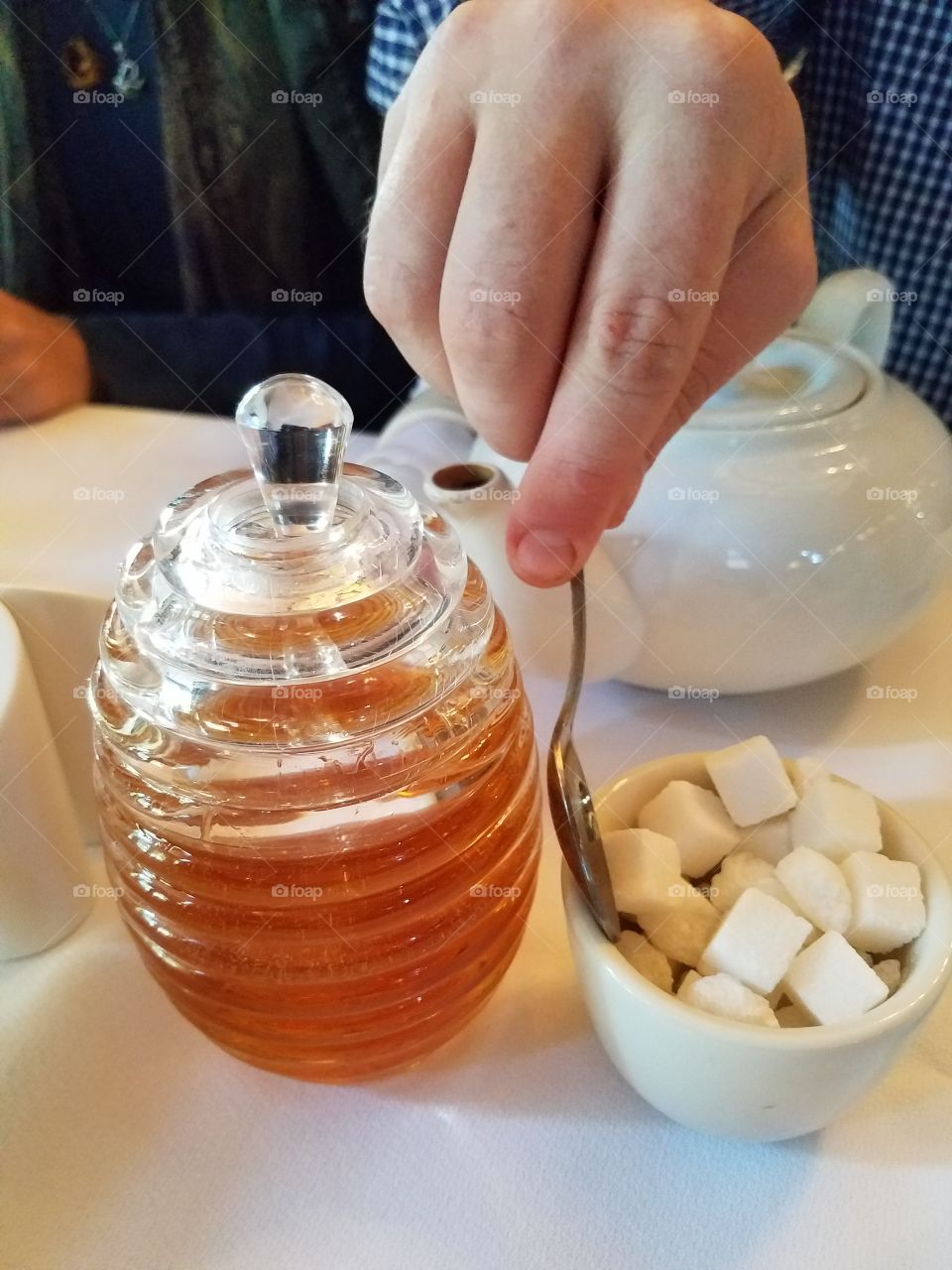 Working Hands Serving Tea