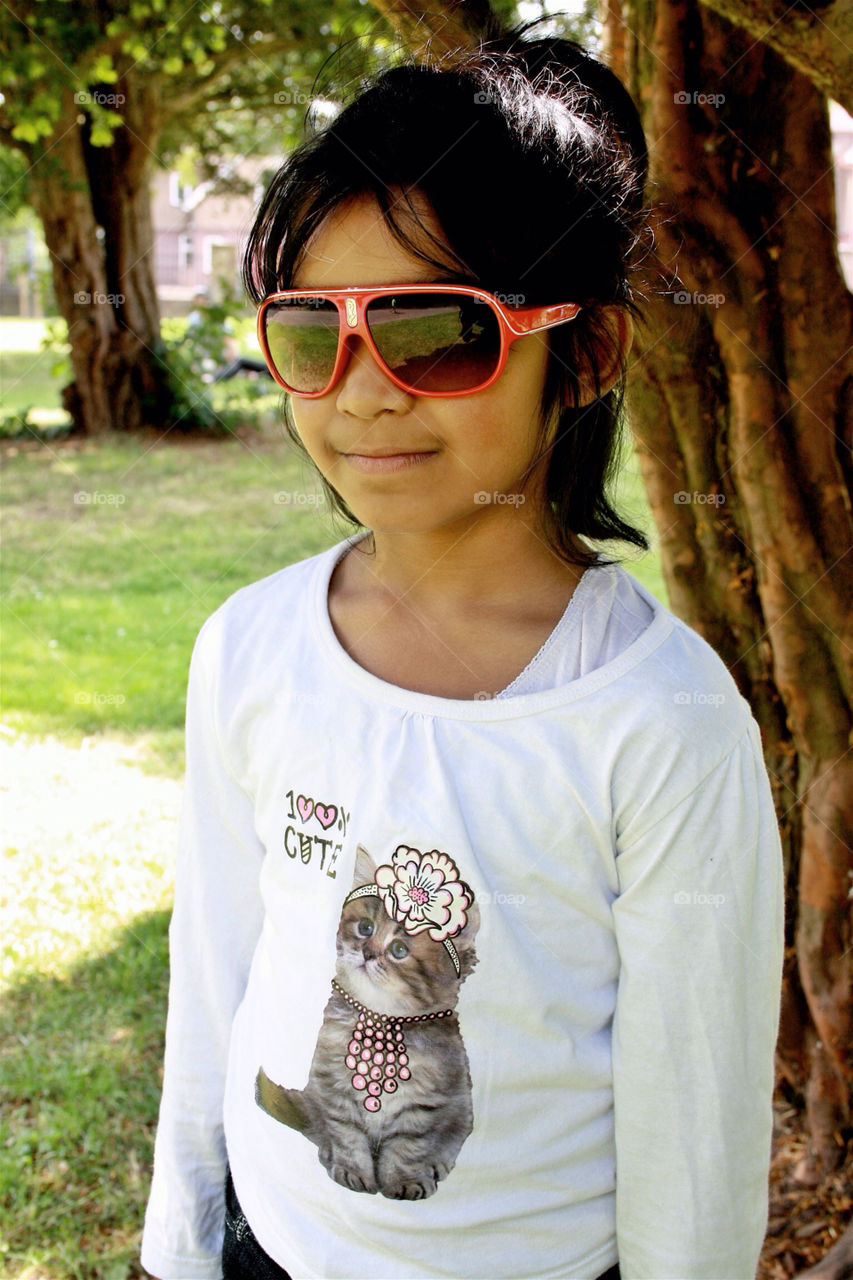girl park sunglasses outside by uzzidaman