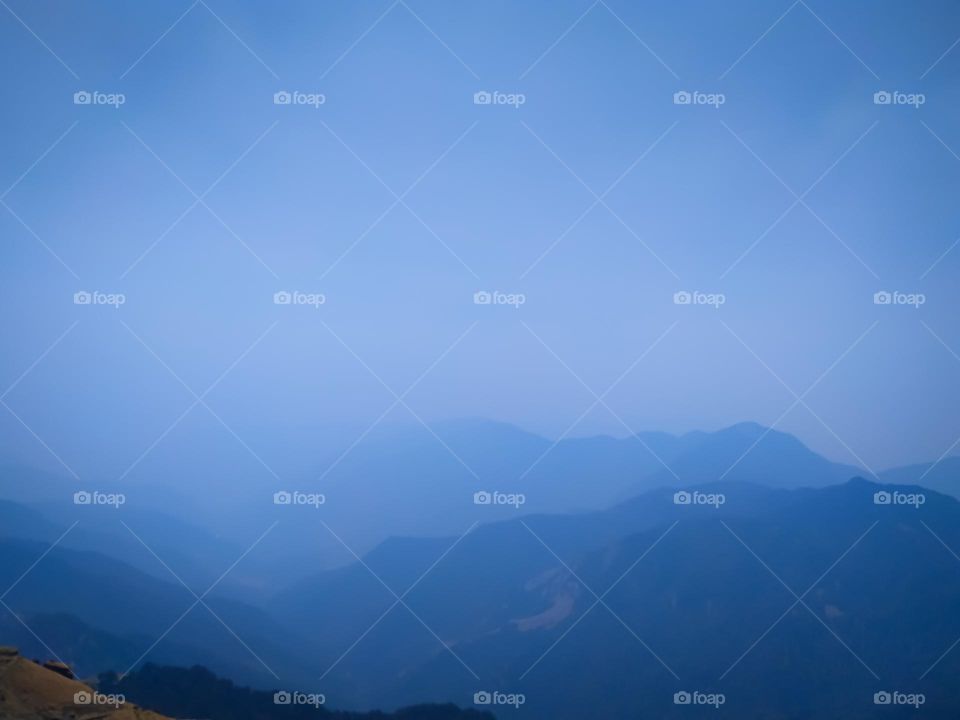 A beautiful view of fog over the mountains