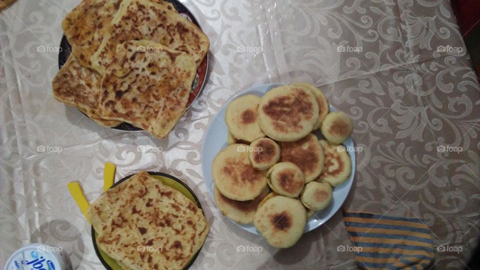 Various bread on table.