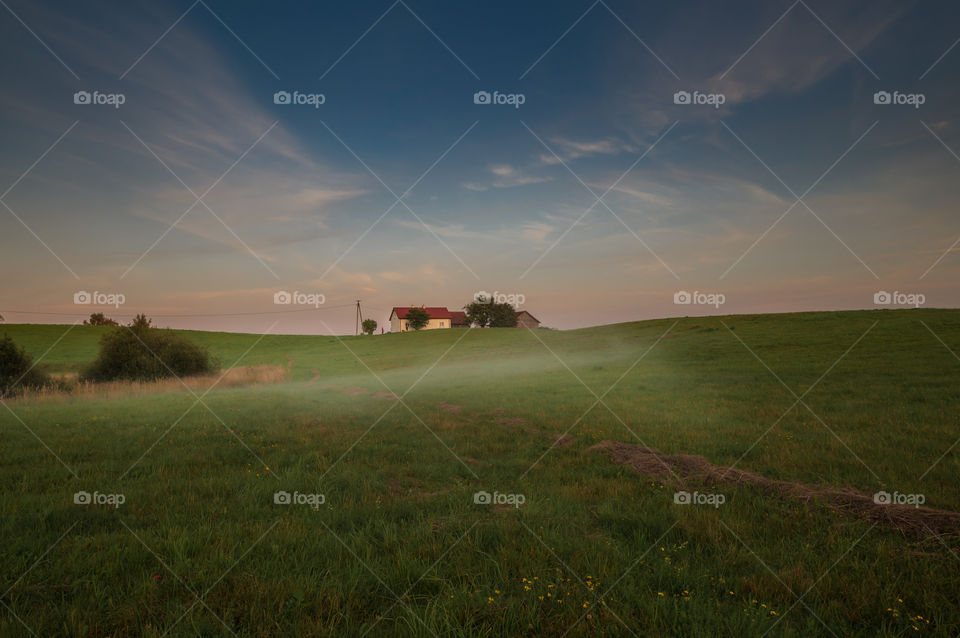 A rural house in the middle of nowhere.