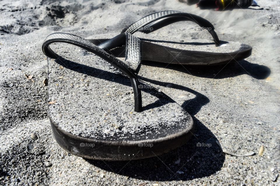 Flip flops in the sand