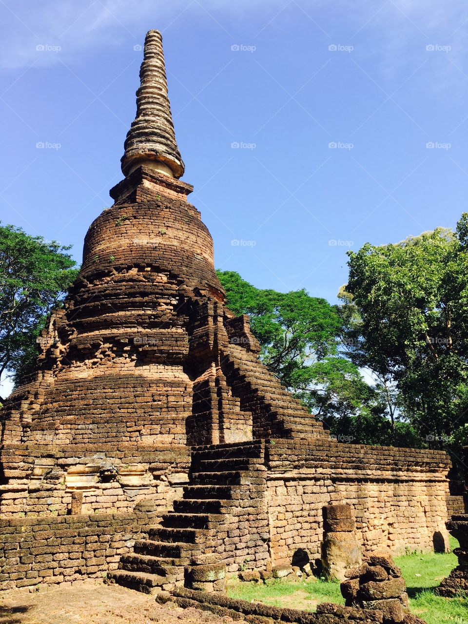 Wat chedi seven rows temple in Sukhothai, Thailand 