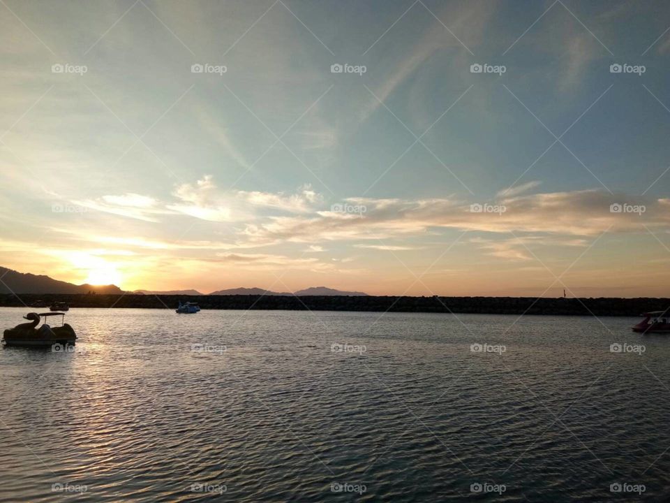 the beautiful view.  sunset in Ulele Beach,  Aceh.